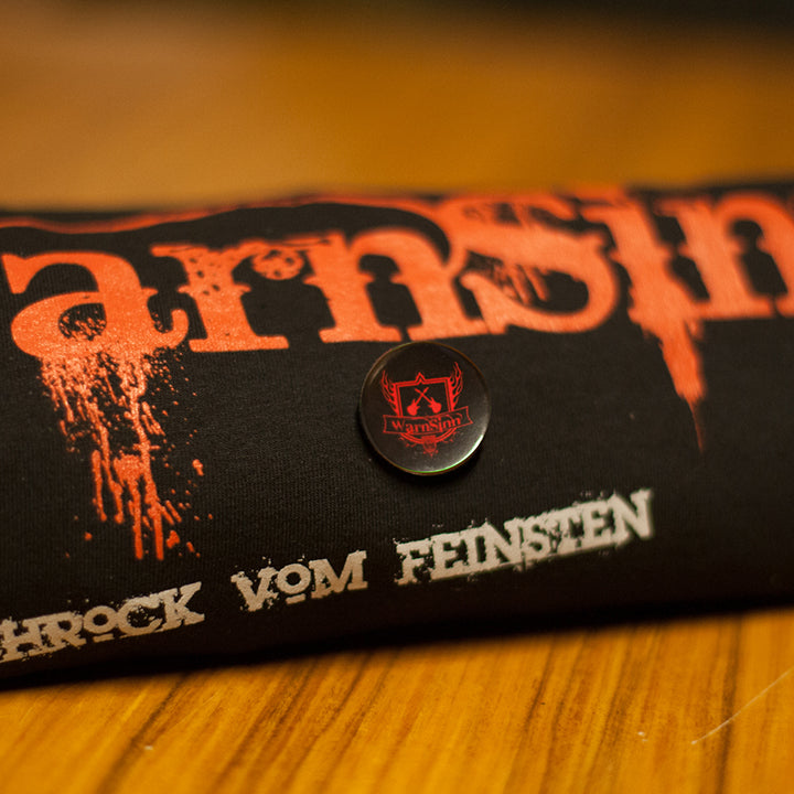 Button “WarnSinn Wappen”